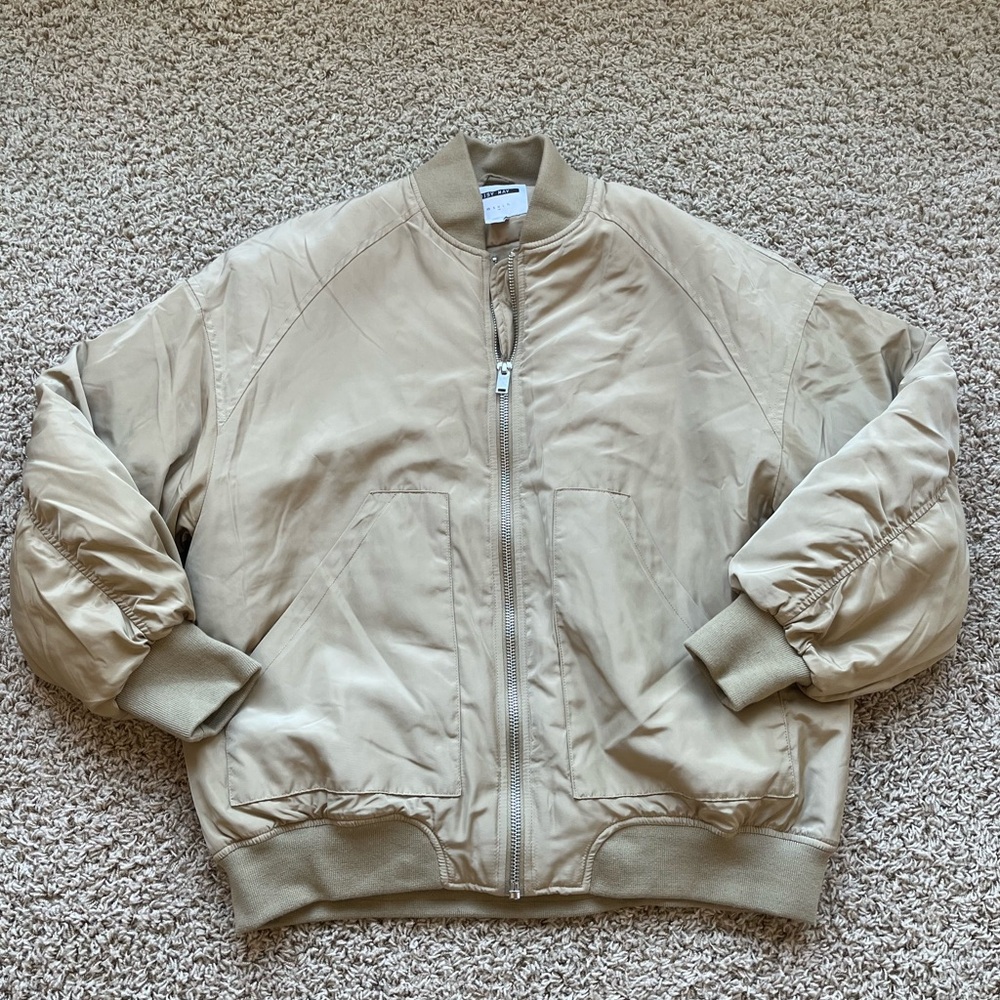 Oversized tan bomber jacket